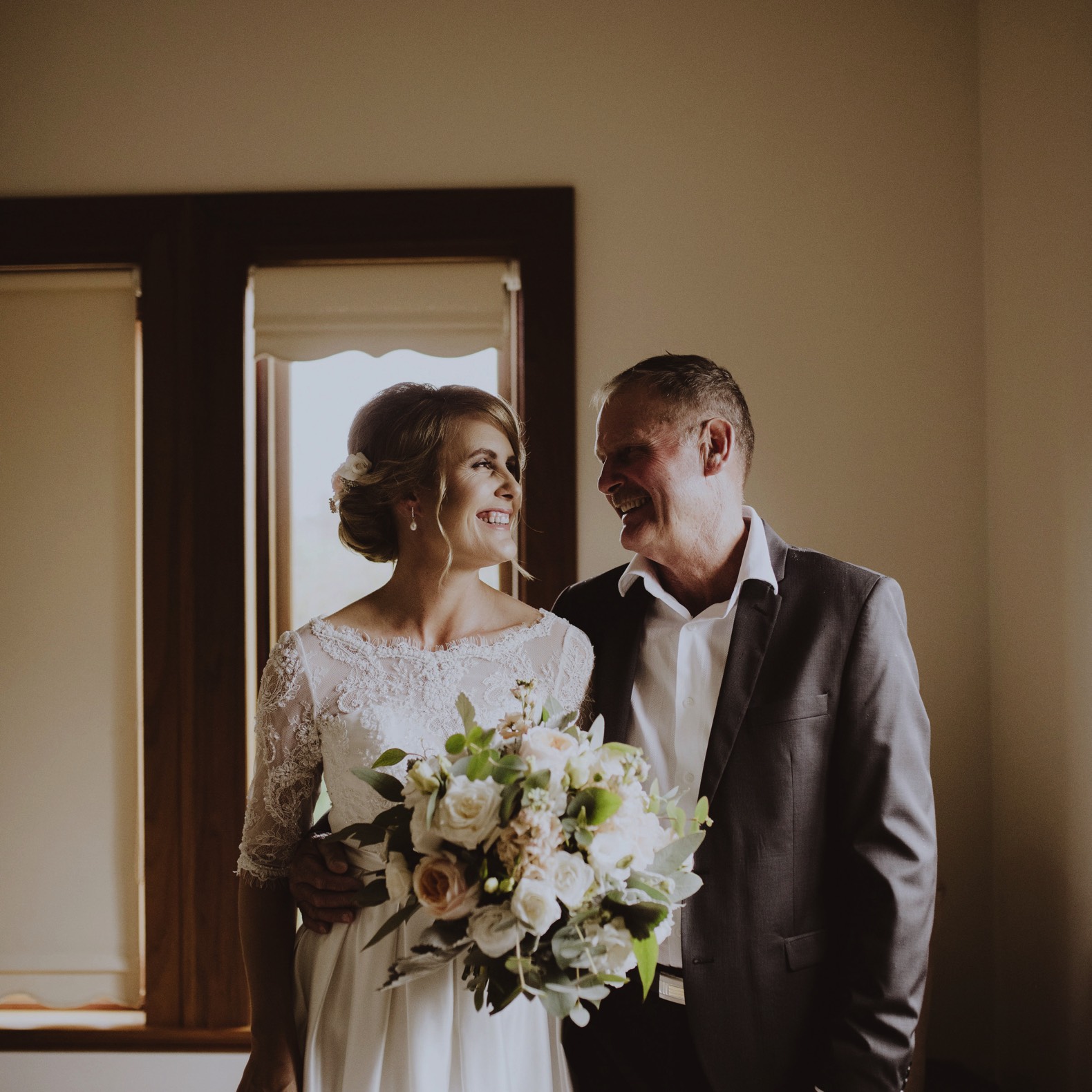 bride and father smiling at each other thornbury lodge stanthorpe