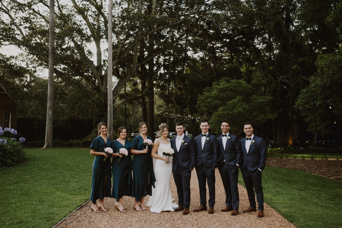 bridal party photos with green dresses